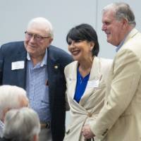 President Mantella taking photo with President Emereti Lubbers and Haas